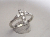 Man wanted a diamond cross ring for his "lady friend." He was specific about diamond size and quality. This was a great simple project milled over a ring tube in Modela Player.