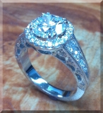 Platinum diamond filigree engagement ring.