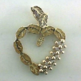 Combined customers' husband and father's ring, to make a leafy heart shaped pendant. the MDX make it easy money.