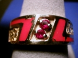 I made this to match my nugget ring previously posted .The stones are rubies and the inlay is enamel...unlike me she still has it.