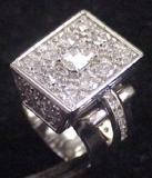 DIAMOND RING SMALL PRONG SET CUT SIDES AND TOP ON MDX ASSEMBLED LIKE BOX.