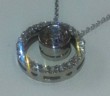 Customer wanted to add something to her diamond bezel pendant.  Designed a circle diamond jacket.  Simple with the 3dwaxmill.