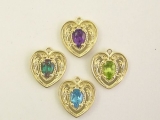 Customer wanted heart charms similiar to Stuller style. Set with 6 x 4 pear emerald, amethyst, blue topaz and peridot.